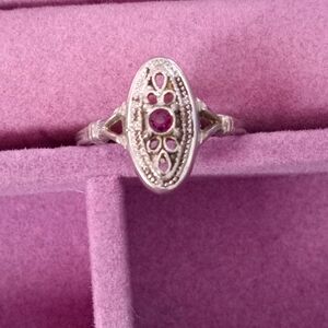 Elegant Silver and Purple Gemstone Ring